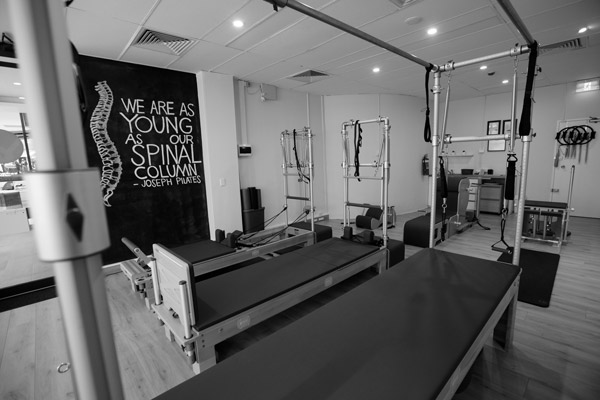 Pilates Caddy and Reformer equipment at Pilateswise northern Beaches studio