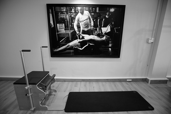 Image of Pilateswise Northern beaches studio with a photograph of Joseph Pilates