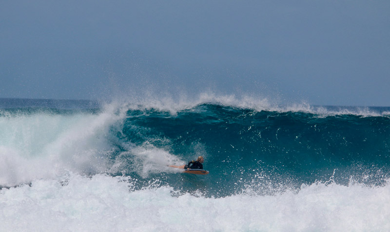 Photo of Karol Garcia surfing